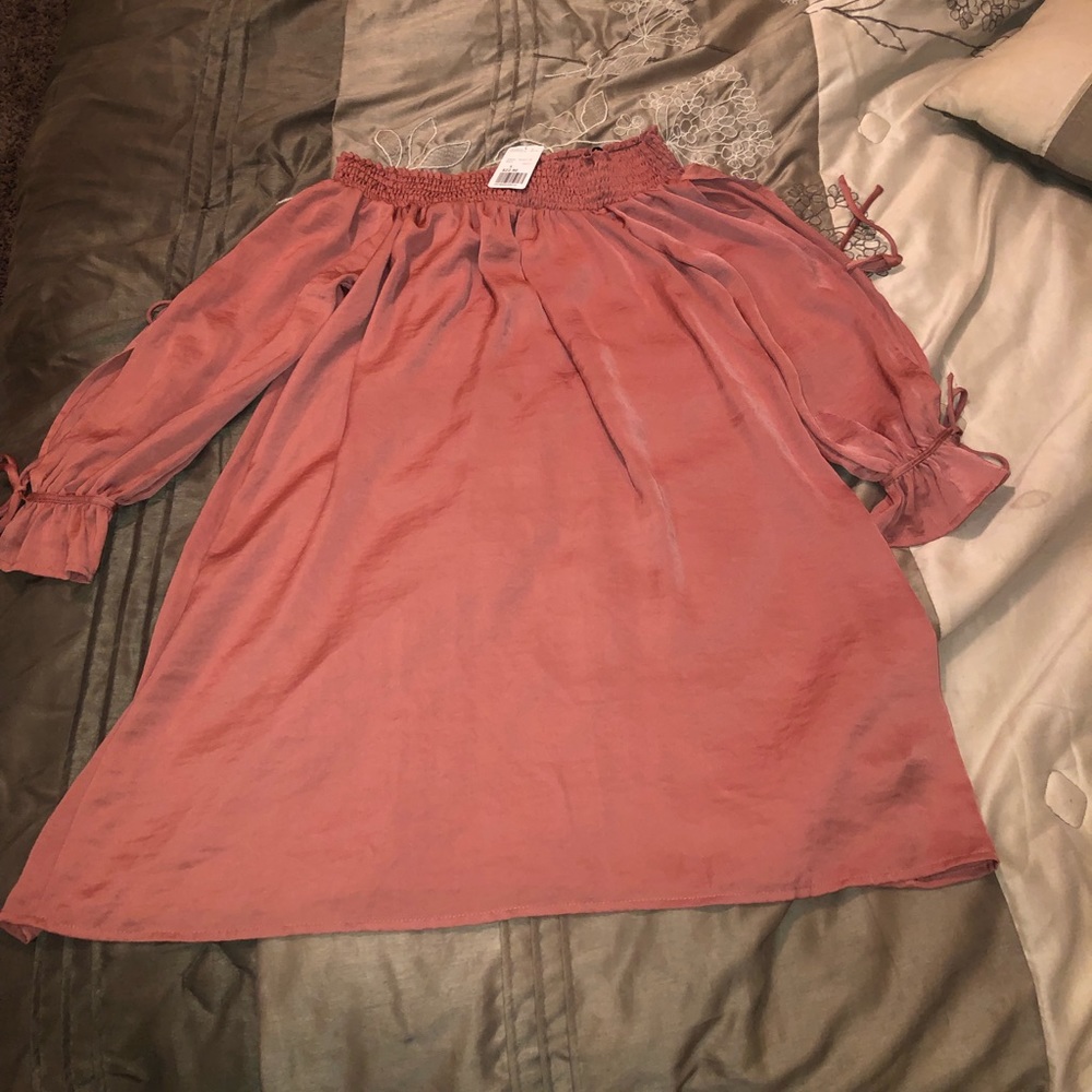 Off the shoulder baby doll dress.